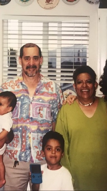 Family photo with Nydia and young Estevan